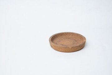 Round coaster made of compressed wood dust