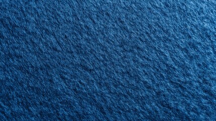 A close-up of blue wool felt fabric, plain from the top view