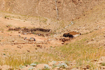 Scenic panoramic views of the limestone Berber house in the canyon of Todgha Gorge in the eastern...