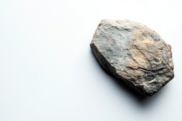 Fototapeta premium Rough stone on a white background