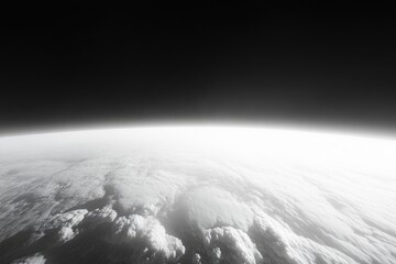 In the foreground is an endless sea of clouds, with a dark black sky in the background. 