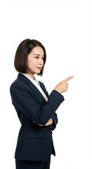 Obraz premium Professional Woman in Business Suit Pointing Towards Empty White Space