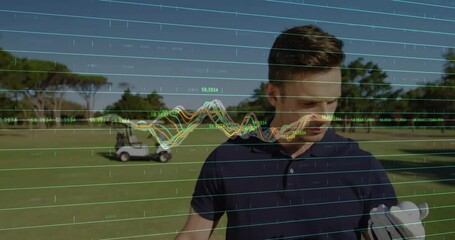 Golfer raising tee examining for golf analytics with data overlay drifting then pulsing behind him - Powered by Adobe