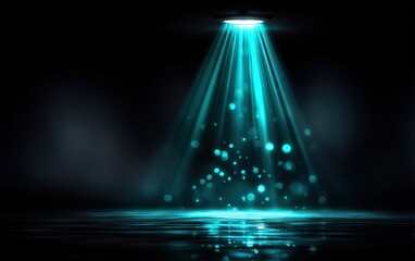 Teal stage light projection on a dark surface