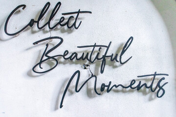 collect beautiful moments motivational words writing on a wall. Inspirational quotes