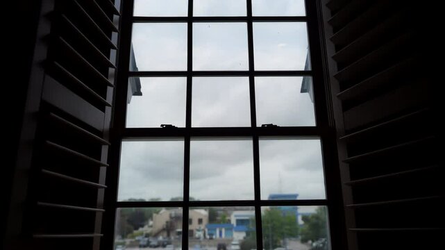 Wooden window with decorative muntin. 