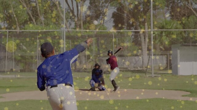 Baseball pitcher planting foot, rotating and releasing ball toward catcher for striking out batter