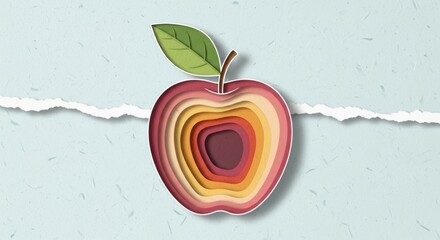 Layered paper cutout of an apple with leaf in warm gradient colors on textured background