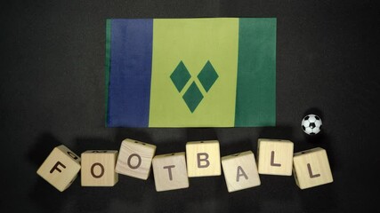 Saint Vincent and the Grenadines flag with football title. football concept