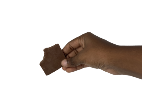 Hand of a man holding a piece of chocolate transparent background