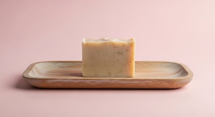Bar Soap on Wood Tray Against Pink Background