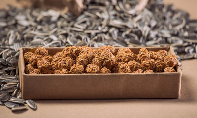 Marinated Nuts with Brown Sauce and Sesame on Burlap Fabric – Rustic Gourmet Snack