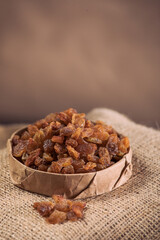 Raisins on White Background – Isolated Dried Fruit