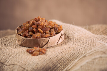 Raisins on White Background – Isolated Dried Fruit