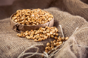 Split Roasted Chickpeas on Burlap Fabric – Rustic Healthy Snack