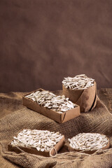 White Sunflower Seeds in Paper Bowls – Eco-Friendly Snack Presentation