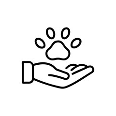 Hand holding a paw print in black outline representing animal care icon © SM
