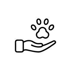 Hand holding a paw print in a gesture of care and protection symbol