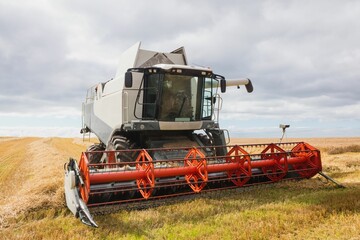 Fototapeta premium View of a harvester on a field
