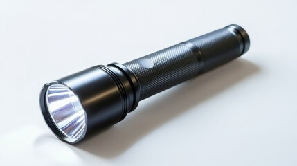 Compact torch flashlight on a white background