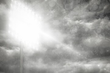 Metal pole topped with floodlight is emitting starburst glow in flat design against cloudy sky