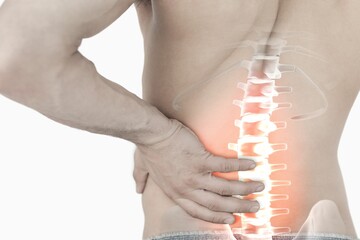 Highlighted spine pain of man
