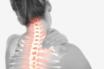 Highlighted spine of woman with back pain