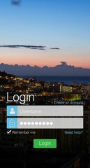 Close-up of login page against illuminated city during sunset
