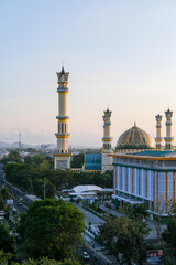 Evening light casts a golden hue over the Islamic Center Mosque in Mataram city, Lombok, with...