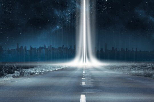 Fototapeta Road leading out to the horizon with light beam