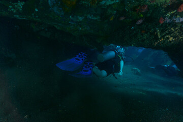 Scuba Divers exploring US Liberty Shipwreck in Bali