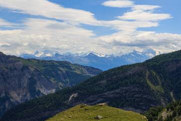Fototapeta premium Mountain panorama with summits and glaciers of Pennine Alps seen from high mountain pass Pas de Cheville in Swiss Alps, Switzerland