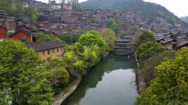 Guizhou, China-APR 06, 2025- Xijiang Miao Village, also known as Xijiang Qianhu Miao Village, is the largest Miao ethnic village in the world, located in Guizhou, China.