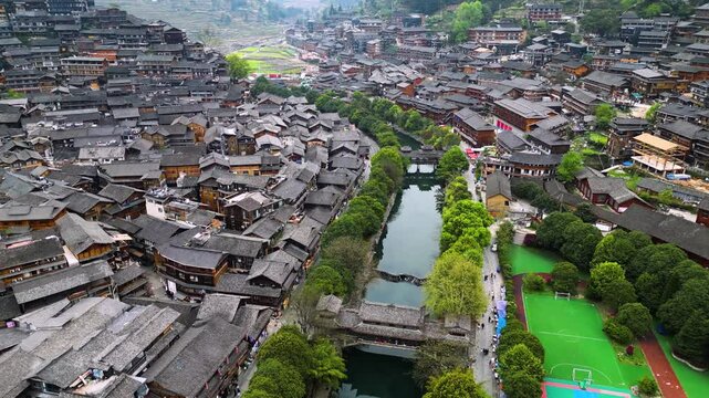 Guizhou, China-APR 06, 2025- Xijiang Miao Village, also known as Xijiang Qianhu Miao Village, is the largest Miao ethnic village in the world, located in Guizhou, China.