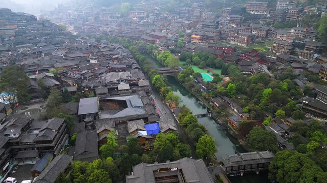 Guizhou, China-APR 06, 2025- Xijiang Miao Village, also known as Xijiang Qianhu Miao Village, is the largest Miao ethnic village in the world, located in Guizhou, China.