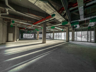 Bright and Spacious Empty Commercial Space with Modern Architectural Features