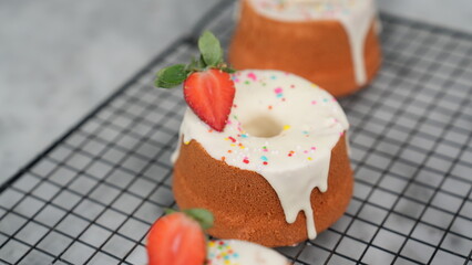 Strawberry Chiffon with white chocolate topping and strawberry pieces and colorful sprinkles