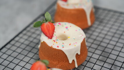 Strawberry Chiffon with white chocolate topping and strawberry pieces and colorful sprinkles