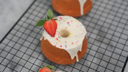 Strawberry Chiffon with white chocolate topping and strawberry pieces and colorful sprinkles