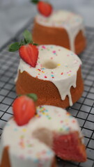 Strawberry Chiffon with white chocolate topping and strawberry pieces and colorful sprinkles