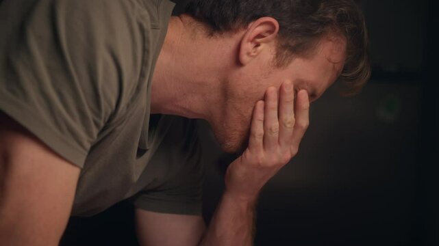 tired investigator or intelligence agent analyzing classified documents. Cluttered desk. Confidential report, surrounded by folders, photographs, and a black marker. Tense, cinematic investigation.