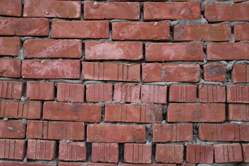 Close-up of a weathered brick wall