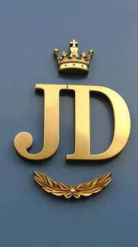 Elegant golden initials JD with royal crown and laurel wreath against a blue wall background