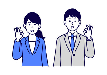 OKサインをするスーツ姿の男女