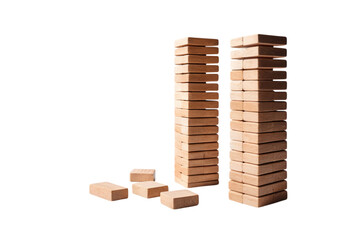 Jenga tower of wooden blocks balanced carefully