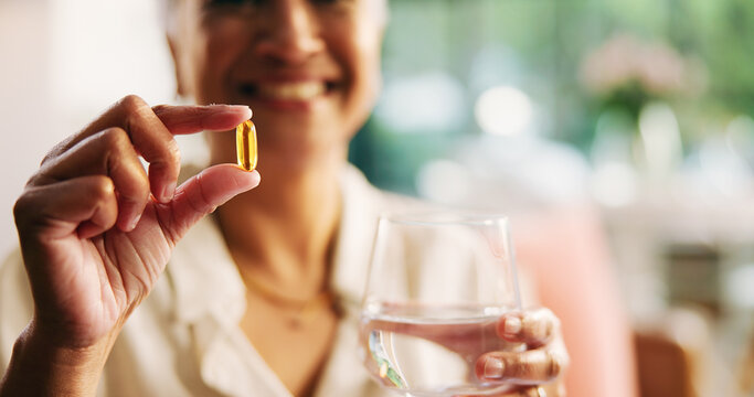 Home, pill and woman hands with water, smile and health with wellness, supplement and recovery. Prescription, pensioner and elderly person with benefits, vitamins and minerals with medicine tablet - Powered by Adobe