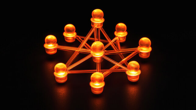 A glowing orange network of interconnected nodes forming a geometric molecular or technological structure on a dark background.