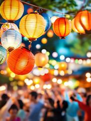 Colorful paper lanterns hanging outdoors at night, festive lights creating a magical atmosphere at a summer festival or garden party