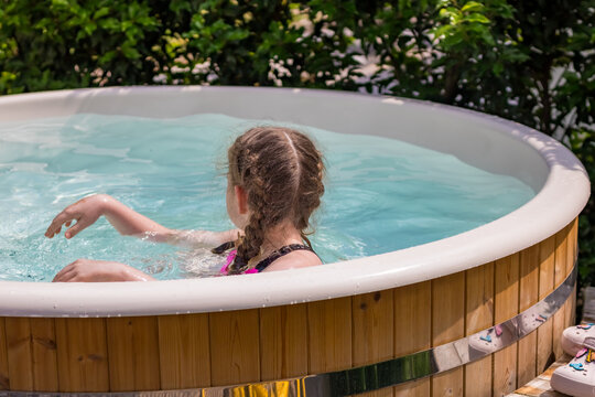 Teenage girl in the pool. High quality photo