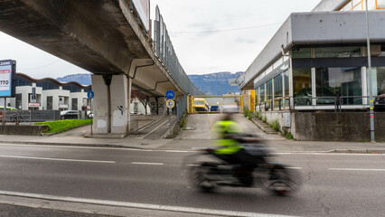 Urban Street Scene: Cyclist Underpass, Modern Buildings